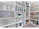 Large walk-in pantry with ample shelving for storage at 1317 Spring Lake Ter, Ocoee, FL 34761