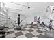 Home gym with various equipment, flooring, and a punching bag at 1317 Spring Lake Ter, Ocoee, FL 34761