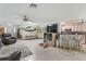 Spacious living room with adjacent kitchen and dining area at 9656 Sw 93Rd Loop, Ocala, FL 34481