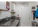Convenient laundry room with washer, dryer, and ample storage at 9656 Sw 93Rd Loop, Ocala, FL 34481