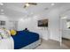 Main bedroom with king-size bed, TV, and ample closet space at 3951 Oakville Ave, Kissimmee, FL 34741