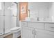 Bathroom features a shower/tub combo and modern vanity at 3951 Oakville Ave, Kissimmee, FL 34741