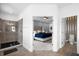 Main bedroom with ensuite bathroom and walk-in shower at 3951 Oakville Ave, Kissimmee, FL 34741