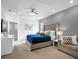 Large Primary suite with king bed and sitting area at 3951 Oakville Ave, Kissimmee, FL 34741