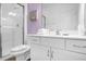 Bathroom with shower, toilet and modern vanity at 3951 Oakville Ave, Kissimmee, FL 34741