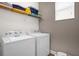 Laundry room with Whirlpool washer and dryer at 3951 Oakville Ave, Kissimmee, FL 34741