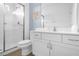 Clean bathroom with white vanity, shower, and toilet at 3951 Oakville Ave, Kissimmee, FL 34741