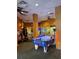 Fun game room with air hockey and various arcade games at 12521 Floridays Resort Dr # 302F, Orlando, FL 32821