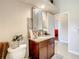 Stylish bathroom with granite vanity and a toilet at 16300 Johns Lake Rd, Clermont, FL 34711