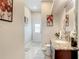 Clean bathroom with granite countertop and walk-in shower at 16300 Johns Lake Rd, Clermont, FL 34711