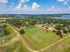 Aerial view showing a home on a spacious lot, ideal for country living at 16300 Johns Lake Rd, Clermont, FL 34711