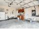 Garage with built-in cabinets and workspace at 16300 Johns Lake Rd, Clermont, FL 34711