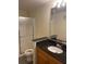 Bathroom featuring a shower, toilet, and vanity with granite top at 824 Camargo Way # 106, Altamonte Springs, FL 32714