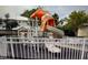 Community playground with a slide and climbing structure at 824 Camargo Way # 106, Altamonte Springs, FL 32714