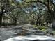 Tree-lined street showcasing the community's landscape at 824 Camargo Way # 106, Altamonte Springs, FL 32714