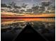 Scenic sunset view over calm lake water at 13857 Marine Dr, Orlando, FL 32832
