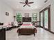 Spacious bedroom with double doors and wood flooring at 13857 Marine Dr, Orlando, FL 32832