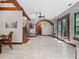 Spacious living area with high ceilings, exposed beams, and hardwood floors at 13857 Marine Dr, Orlando, FL 32832