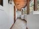 Covered patio with tile flooring and wooden ceiling beams at 13857 Marine Dr, Orlando, FL 32832