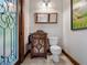 Charming powder room features ornate vanity and decorative mirror at 13857 Marine Dr, Orlando, FL 32832