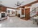 Open living room with high ceilings and a fireplace at 13857 Marine Dr, Orlando, FL 32832