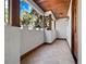 Covered patio with tile flooring and wooden ceiling beams at 13857 Marine Dr, Orlando, FL 32832