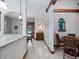 Cozy dining area with a small table and chairs, adjacent to the kitchen at 13857 Marine Dr, Orlando, FL 32832