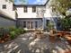 Relaxing patio area with a fire pit and seating at 13857 Marine Dr, Orlando, FL 32832