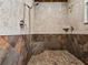 Walk-in shower with tiled walls, built-in seat, and dual shower heads at 13857 Marine Dr, Orlando, FL 32832