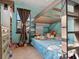 bedroom with a bunk bed and colorful bedding at 13857 Marine Dr, Orlando, FL 32832