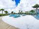 White sand beach area with lounge chairs at 8035 Knee Deep Rd, Kissimmee, FL 34747
