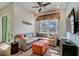 Relaxing living room with comfortable sectional sofa and large TV at 8035 Knee Deep Rd, Kissimmee, FL 34747