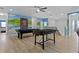 Game room includes pool table and foosball at 6032 Broad Oak Dr, Davenport, FL 33837