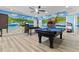 Game room features pool table, foosball, and mural at 6032 Broad Oak Dr, Davenport, FL 33837