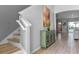 Bright entryway with stairs and console table at 6032 Broad Oak Dr, Davenport, FL 33837