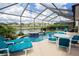 Screened pool and patio with lake view at 3001 Sunset Vista Blvd, Kissimmee, FL 34747