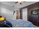 Bedroom with ceiling fan and a dresser at 2570 Amaya Ter, Lake Mary, FL 32746