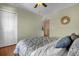 Bedroom with double doors and a ceiling fan at 2570 Amaya Ter, Lake Mary, FL 32746