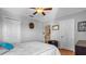 Bedroom with a ceiling fan and double doors at 2570 Amaya Ter, Lake Mary, FL 32746