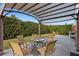Relaxing patio area with pergola and outdoor seating at 2570 Amaya Ter, Lake Mary, FL 32746