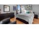 Bedroom with hardwood floors and large window at 2570 Amaya Ter, Lake Mary, FL 32746