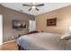 Spacious bedroom with a ceiling fan and ample closet space at 2570 Amaya Ter, Lake Mary, FL 32746