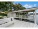 Private boat dock with covered area, bench and waterfront access at 421 Lakewood Dr, Winter Park, FL 32789