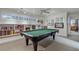 Game room features a pool table and built-in shelving at 421 Lakewood Dr, Winter Park, FL 32789