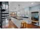 Modern kitchen with white cabinets, granite countertops, and stainless steel appliances at 421 Lakewood Dr, Winter Park, FL 32789