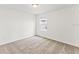 Bright bedroom with carpet flooring and window at 5953 Catamaran Ave, Haines City, FL 33844