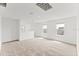 Spacious bonus room with carpet, two windows and vaulted ceiling at 5953 Catamaran Ave, Haines City, FL 33844