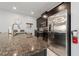 Modern kitchen with stainless steel appliances and granite countertops at 4803 Brier Rose Ln, Kissimmee, FL 34746