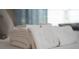 Neatly folded white towels on a bed at 4803 Brier Rose Ln, Kissimmee, FL 34746