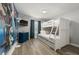 bedroom with a Frozen mural, bunk beds, and a dresser at 4803 Brier Rose Ln, Kissimmee, FL 34746